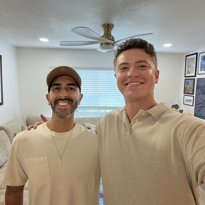 Jared Harman with a client inside a home